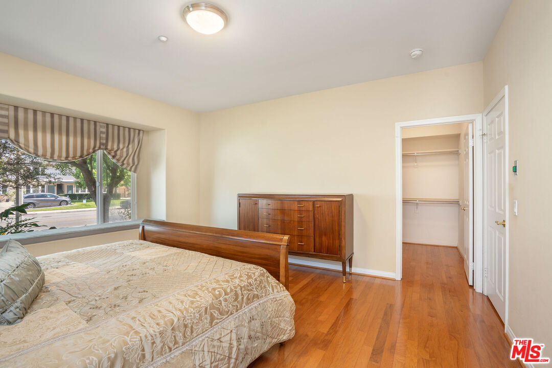 1128 West Duarte Road, Unit A Arcadia, CA 91007 - Photo 21 of 28 a bed room with a bed and a large window