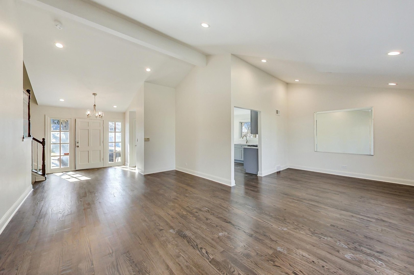 1835 Smith Road Northbrook, IL 60062 - Photo 7 of 54 a view of an empty room wooden floor and a kitchen