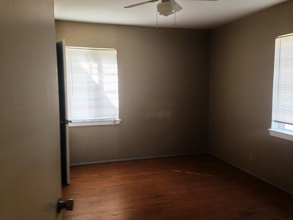 5342 Leeland Street, Unit 2 Houston, TX 77023 - Photo 2 of 8 an empty room with a window