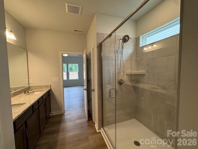 206 Rodeo Drive Shelby, NC 28150 - Photo 15 of 19 a bathroom with a granite countertop sink a shower and a mirror