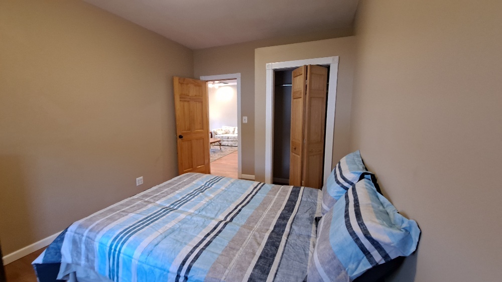 122 Portland Avenue Oglesby, IL 61348 - Photo 13 of 25 a bedroom with a bed and a window