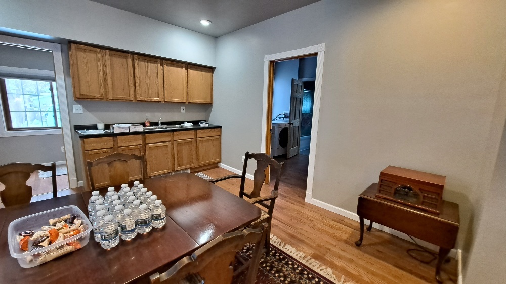 122 Portland Avenue Oglesby, IL 61348 - Photo 9 of 25 a kitchen with stainless steel appliances granite countertop a stove a sink and a refrigerator