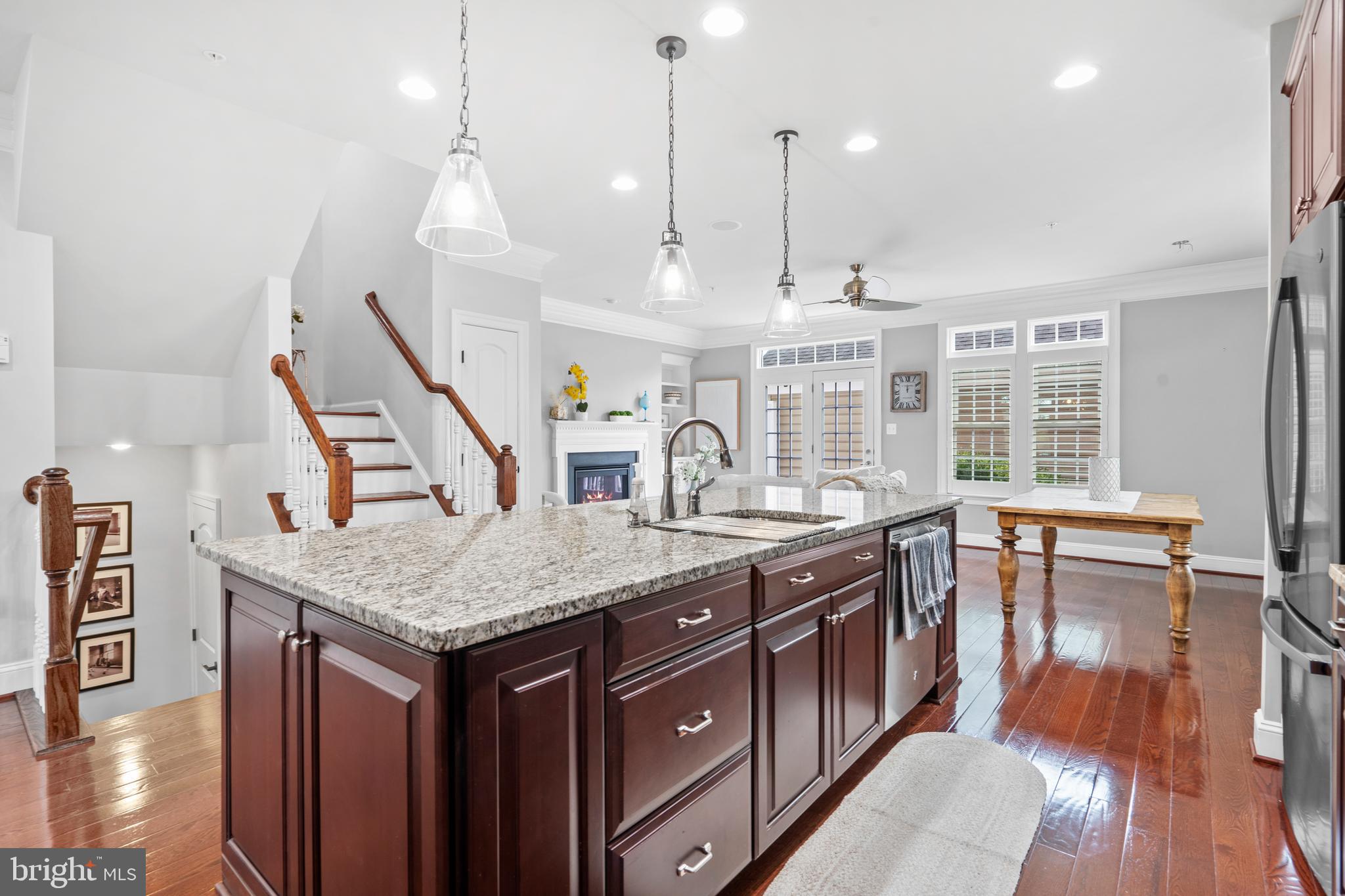 3822 Jacob Stout Road Doylestown, PA 18902 - Photo 15 of 39 a kitchen with stainless steel appliances granite countertop a stove a sink dishwasher and a wooden cabinets with wooden floor