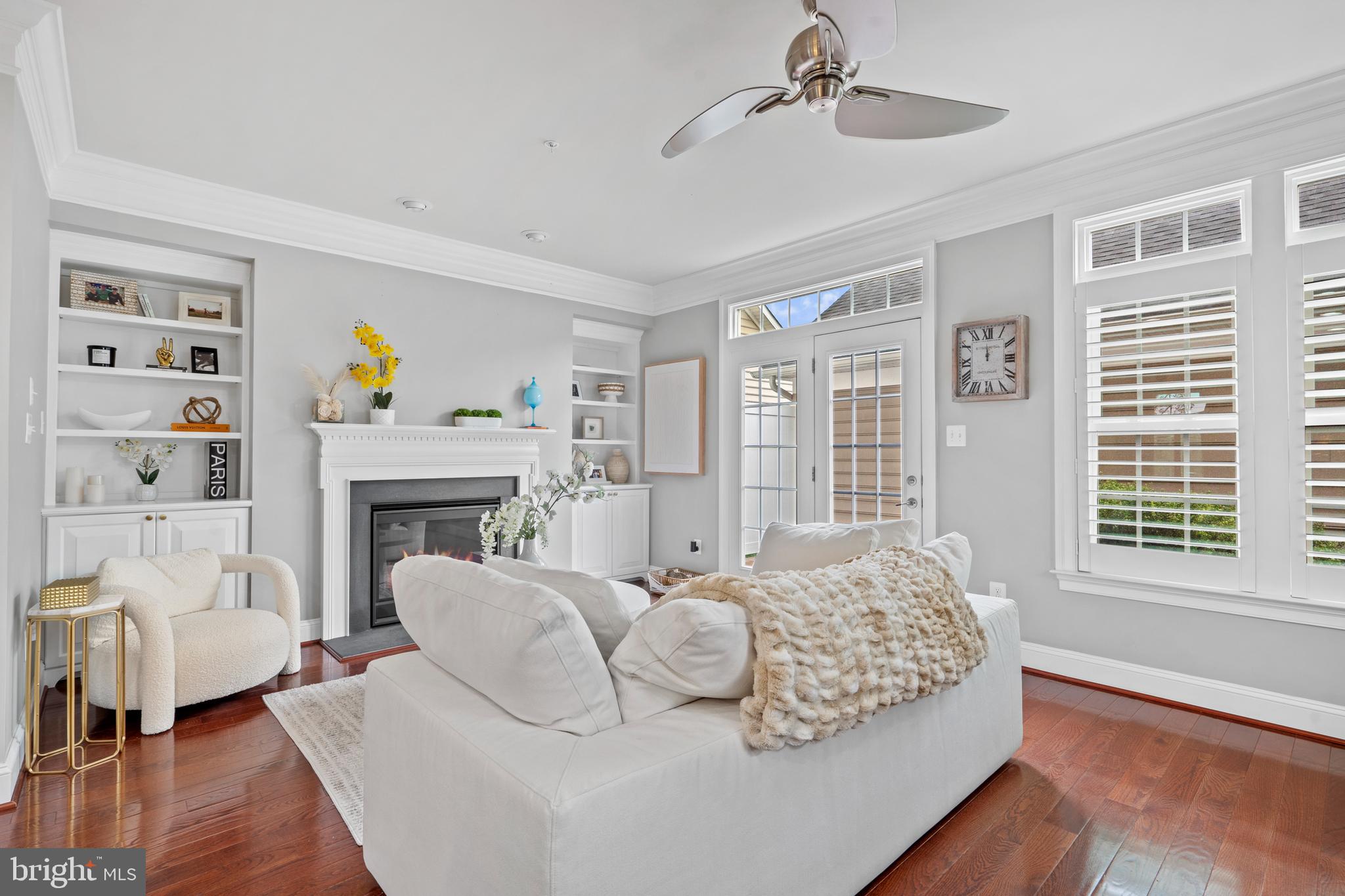 3822 Jacob Stout Road Doylestown, PA 18902 - Photo 16 of 39 a living room with furniture fireplace and window