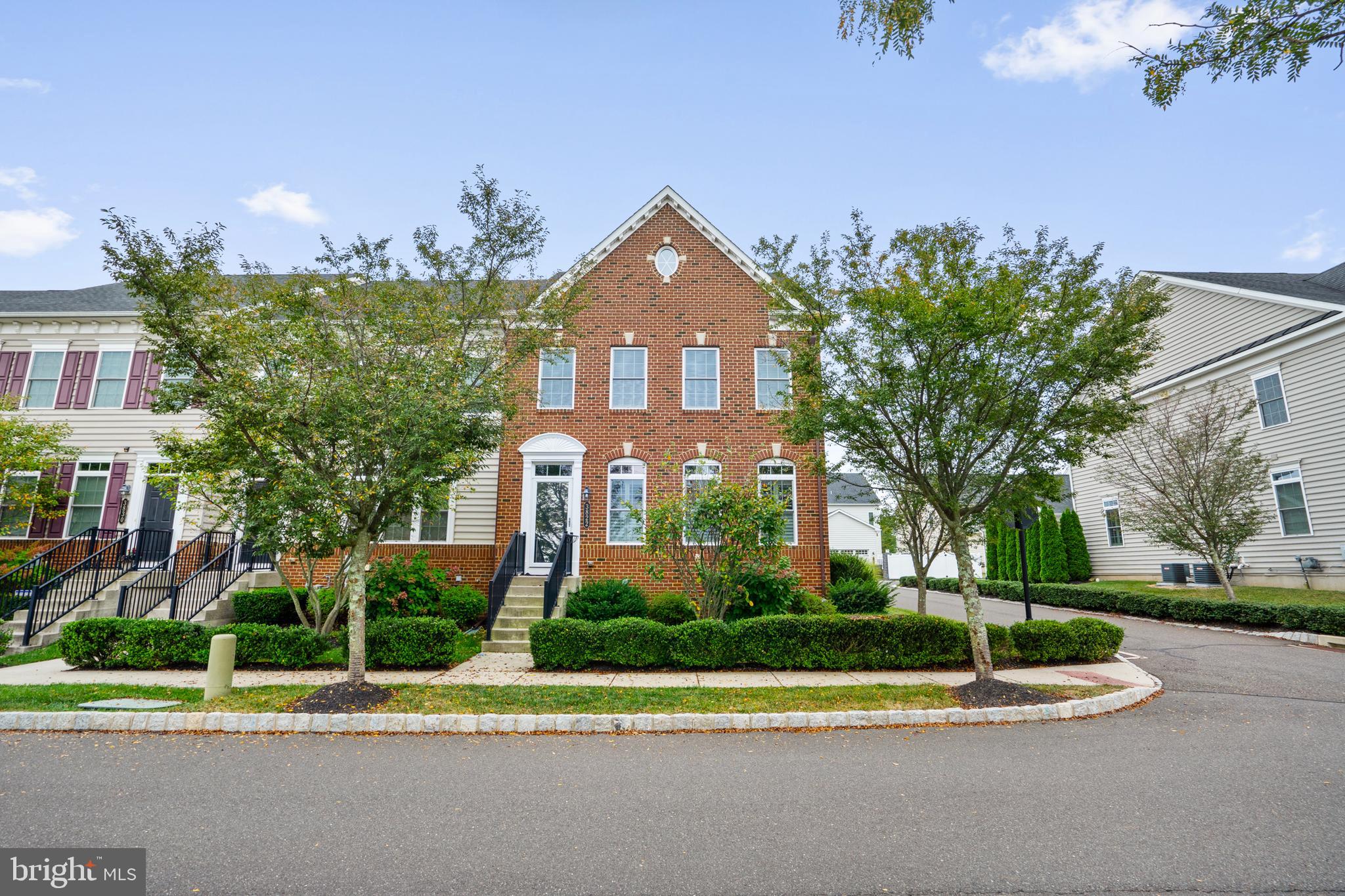3822 Jacob Stout Road Doylestown, PA 18902 - Photo 2 of 39 a front view of a house with a yard and palm trees