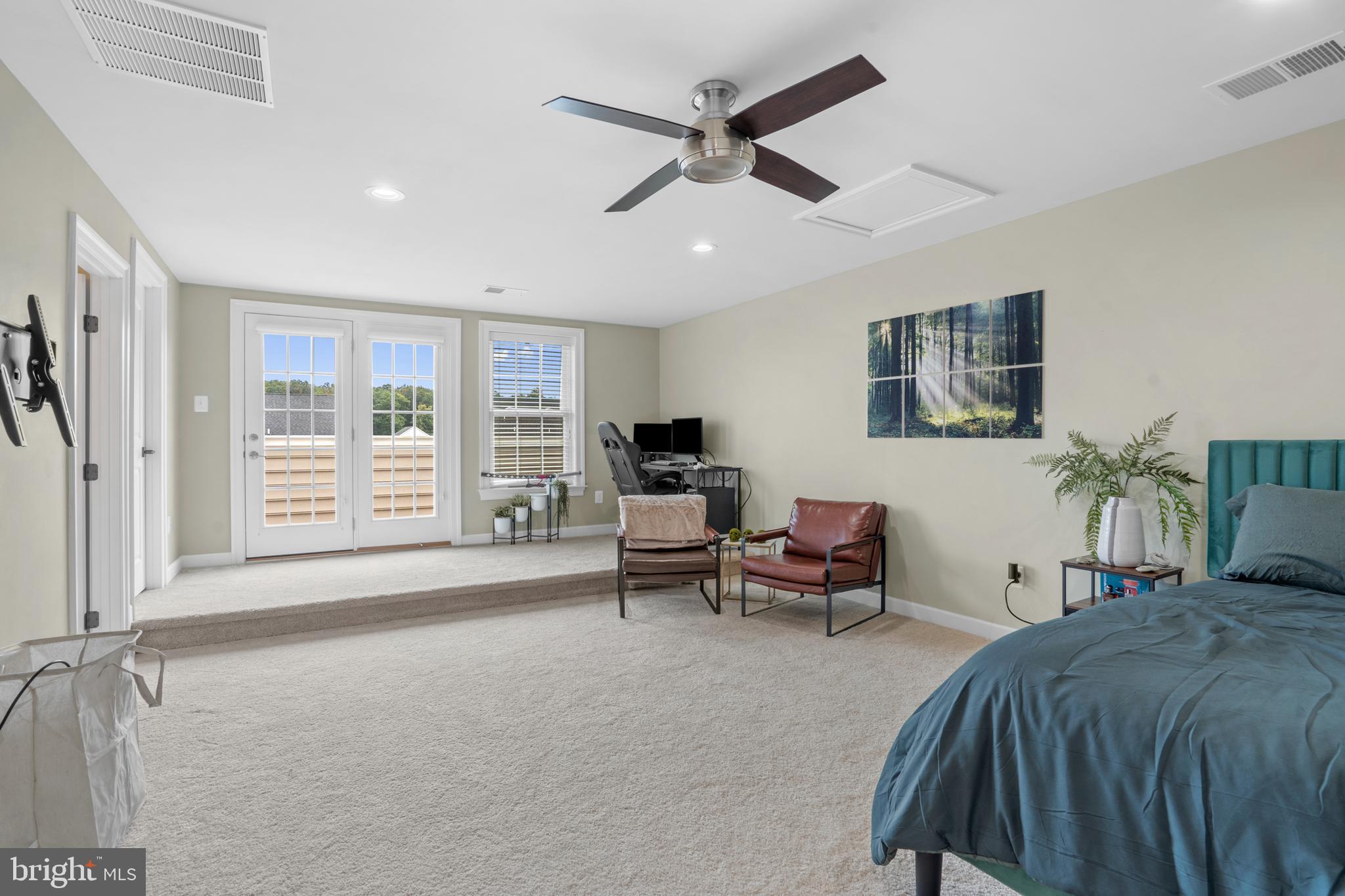 3822 Jacob Stout Road Doylestown, PA 18902 - Photo 28 of 39 a spacious bedroom with a bed and a large window