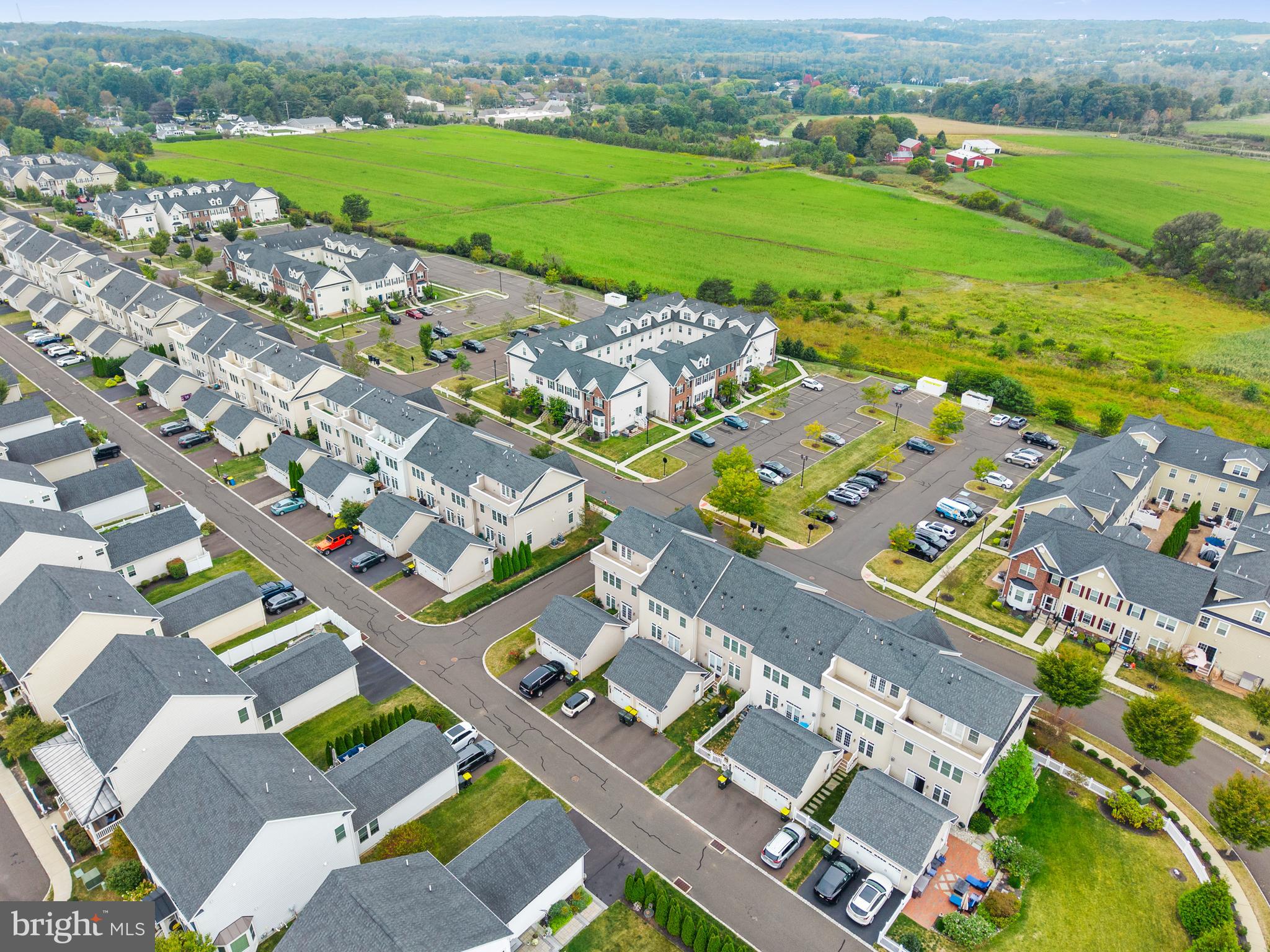 3822 Jacob Stout Road Doylestown, PA 18902 - Photo 38 of 39 an aerial view of a city with lots of residential buildings ocean and mountain view in back