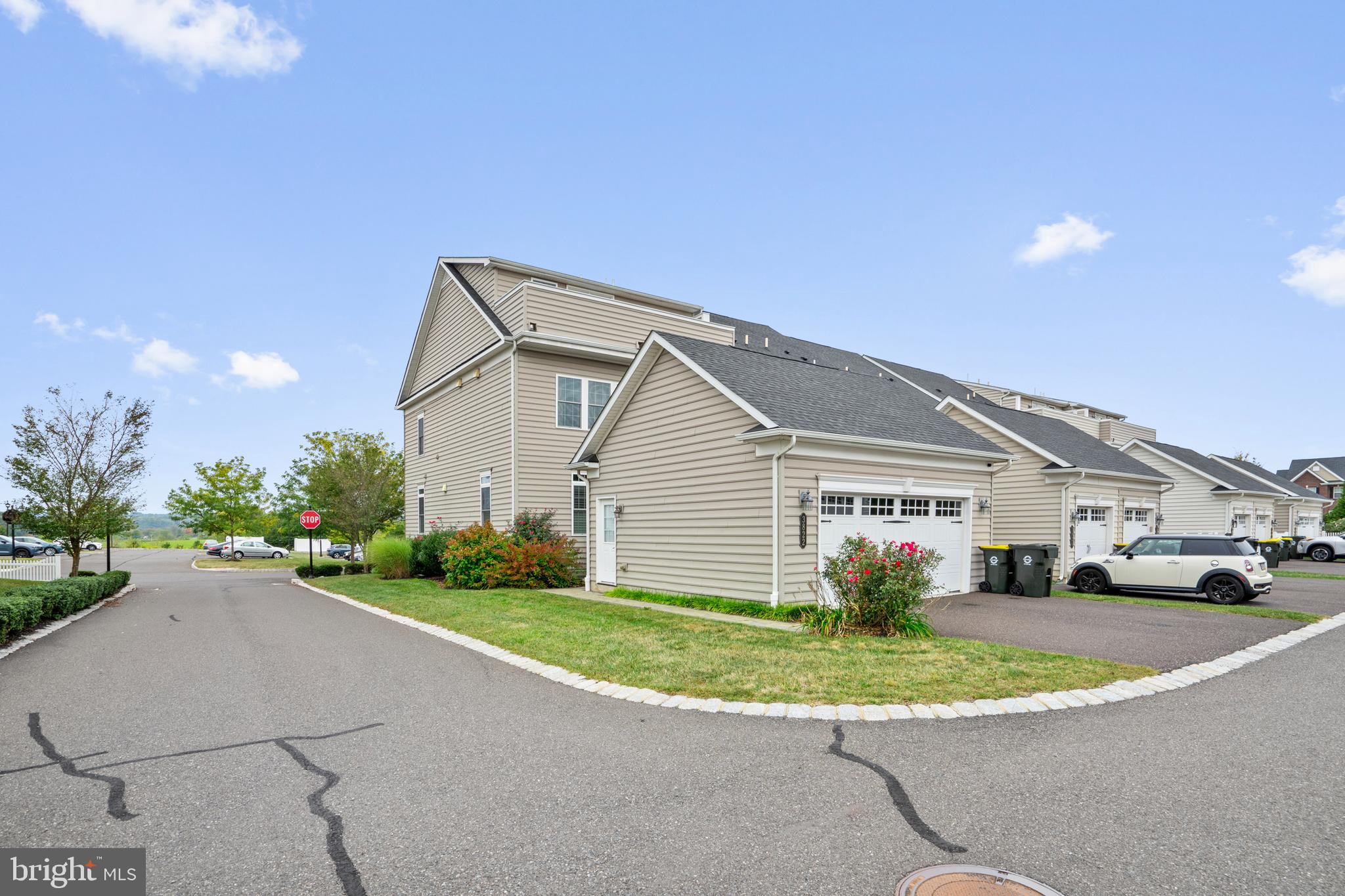 3822 Jacob Stout Road Doylestown, PA 18902 - Photo 4 of 39 a front view of a house with a yard and garage