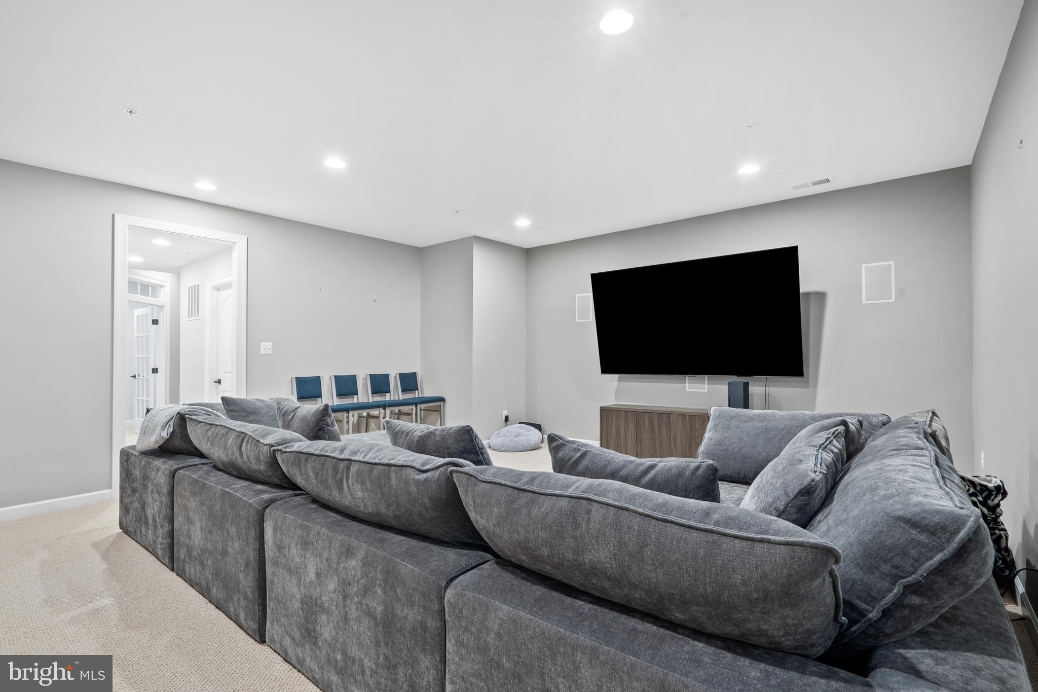 3822 Jacob Stout Road Doylestown, PA 18902 - Photo 9 of 39 a living room with furniture and a flat screen tv