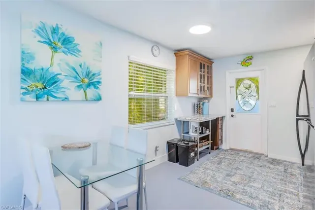 a workspace with furniture and a window