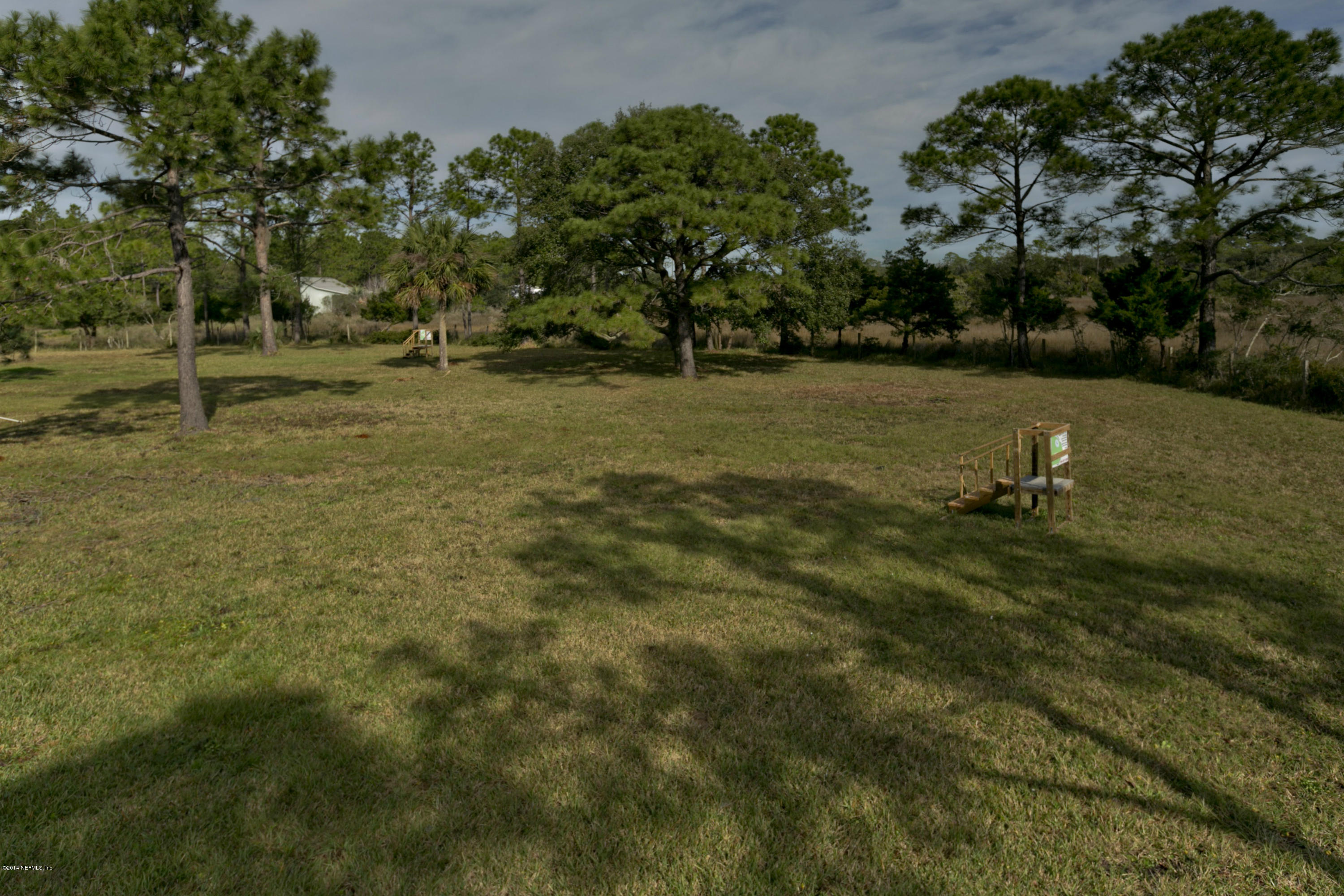 Xx Stokes Landing Road St. Augustine, FL 32095 - Photo 5 of 16 a backyard of a house with lots of green space
