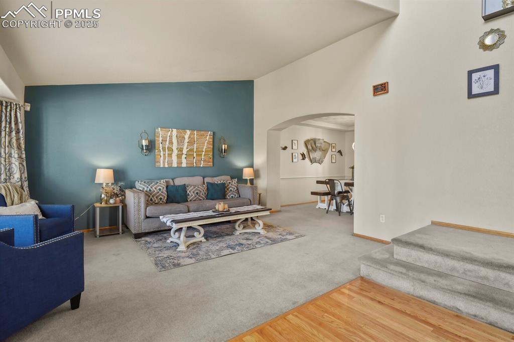 7660 Bullet Road Peyton, CO 80831 - Photo 4 of 50 a living room with furniture and wooden floor