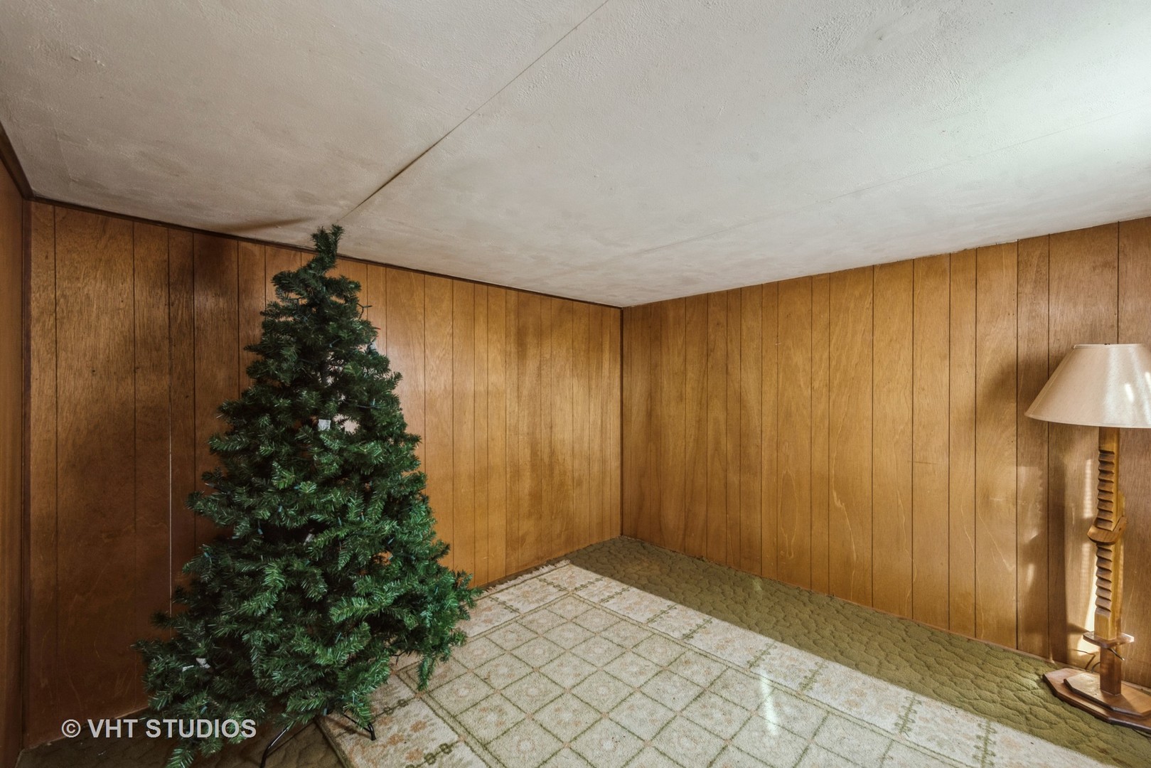 N1506 County C Road Sharon, WI 53585 - Photo 12 of 19 a view of a room with flower plants and wooden walls
