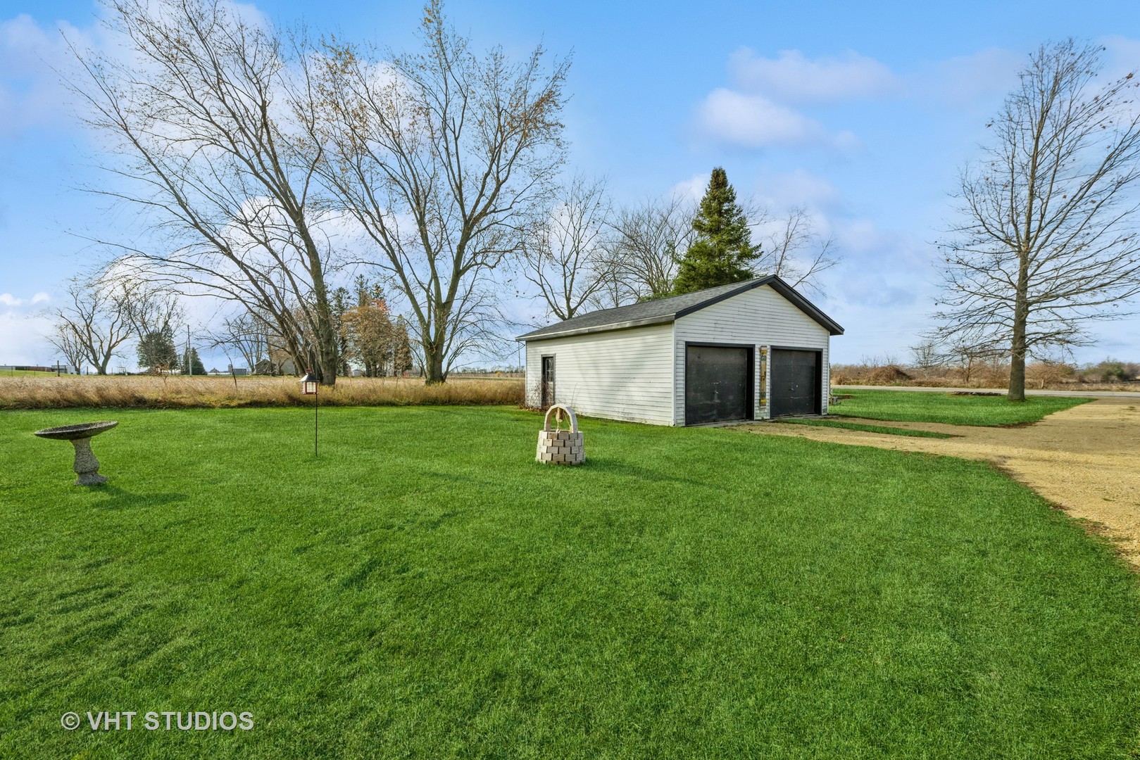 N1506 County C Road Sharon, WI 53585 - Photo 15 of 19 a front view of a house with garden