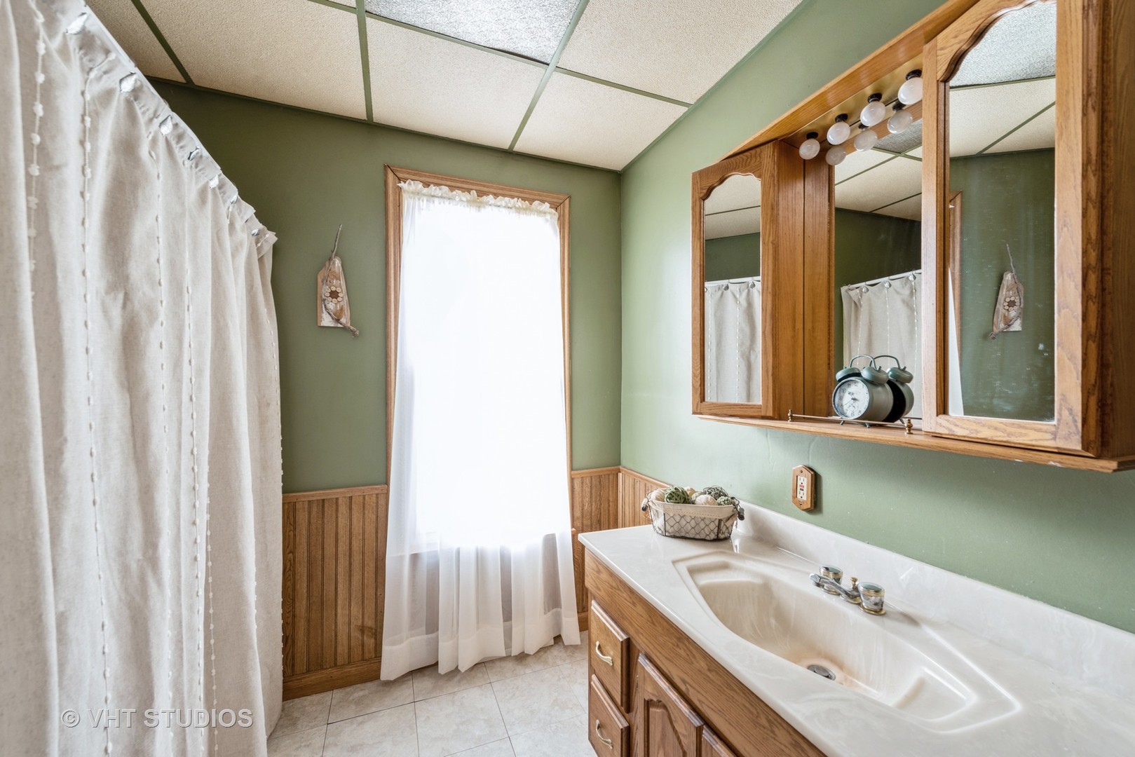 N1506 County C Road Sharon, WI 53585 - Photo 10 of 19 a bathroom with a sink and a mirror