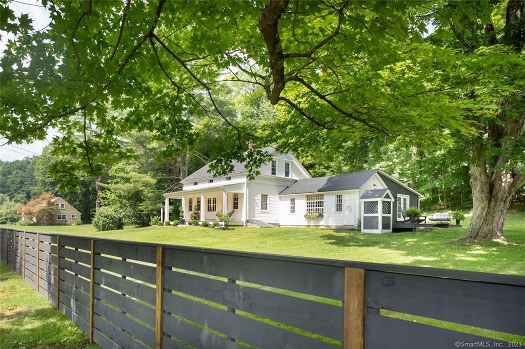 63 Warren Turnpike Road Canaan, CT 06031 - Photo 1 of 1 a house view with a garden space