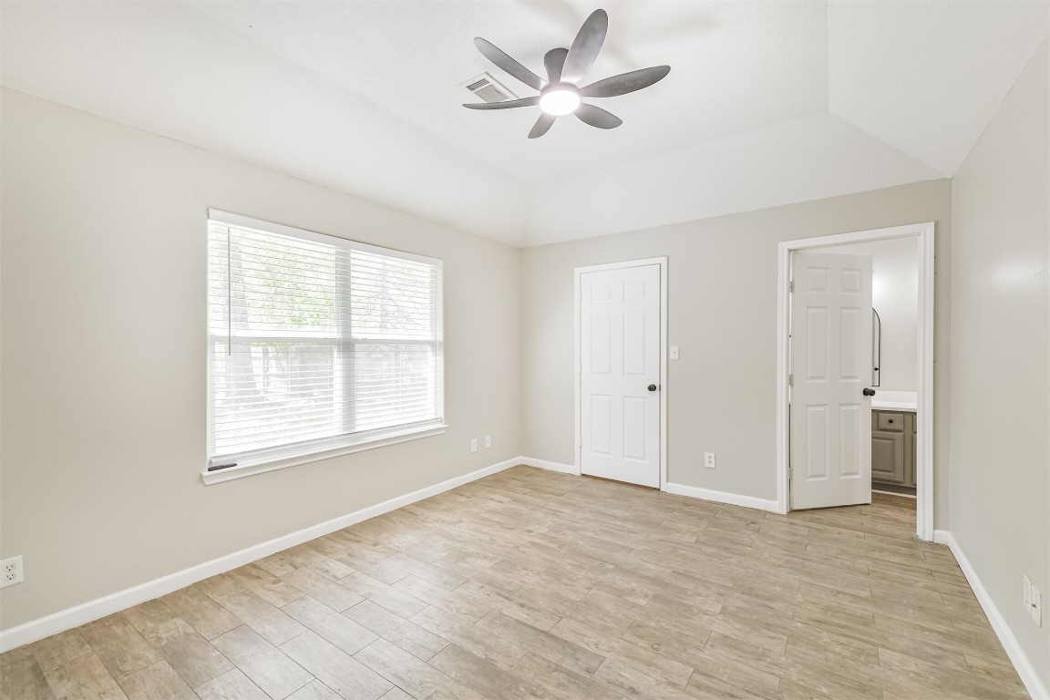 16468 Ryan Guinn Way Conroe, TX 77303 - Photo 15 of 31 a view of an empty room with a window