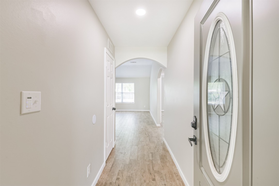 16468 Ryan Guinn Way Conroe, TX 77303 - Photo 4 of 31 view of a room with door