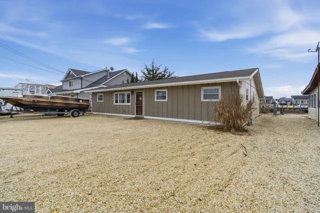 a house view with a backyard space