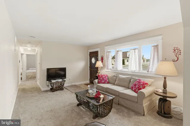 a living room with furniture and a couch