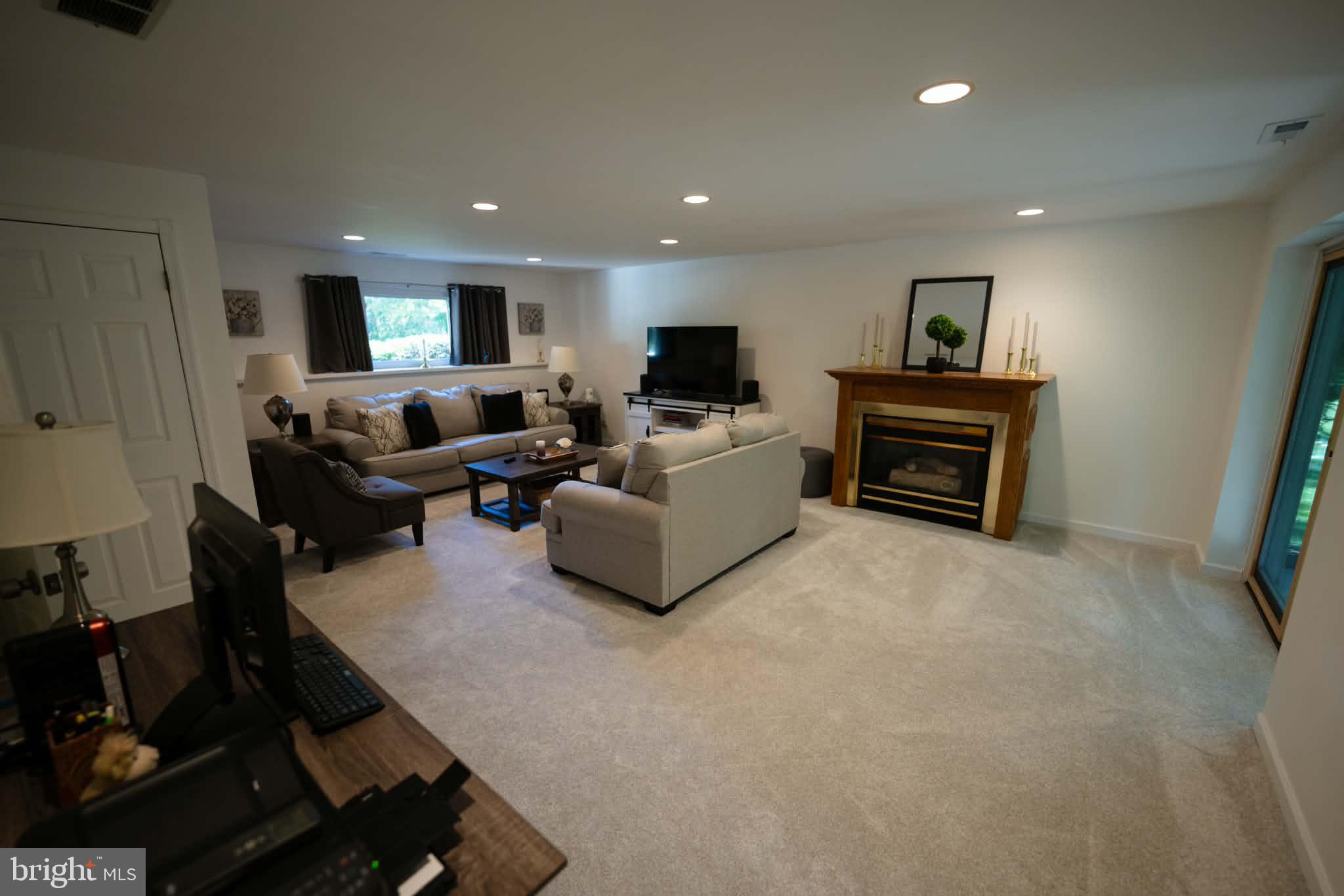809 Anthony Road Atco, NJ 08004 - Photo 32 of 38 Lower level family room with gas fireplace
