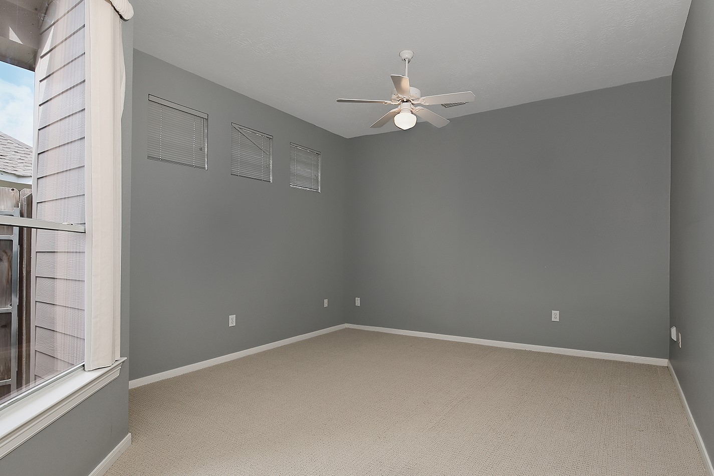 7 Sovereign Way Conroe, TX 77384 - Photo 16 of 47 an empty room with a window