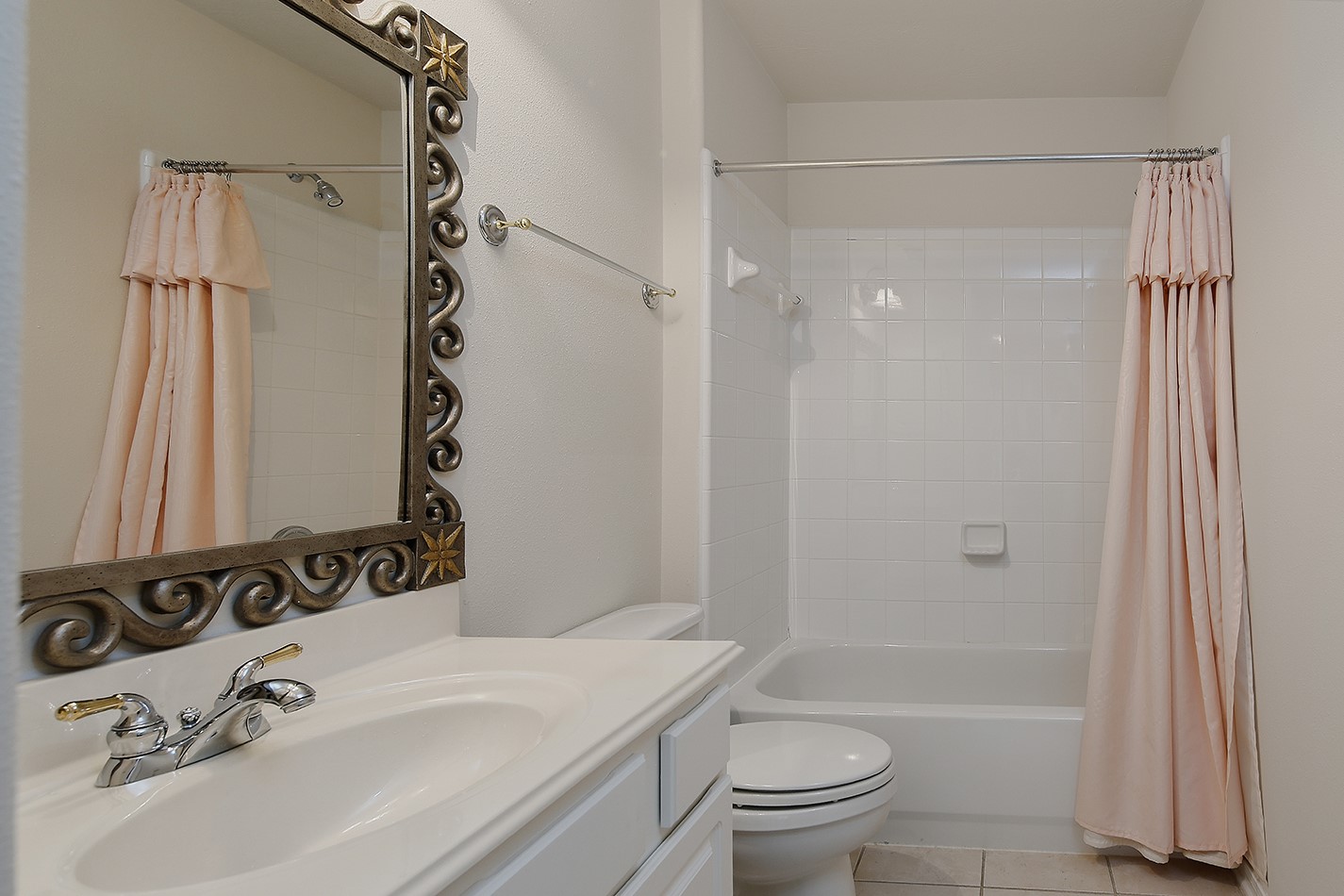 7 Sovereign Way Conroe, TX 77384 - Photo 27 of 47 a bathroom with a sink toilet and shower