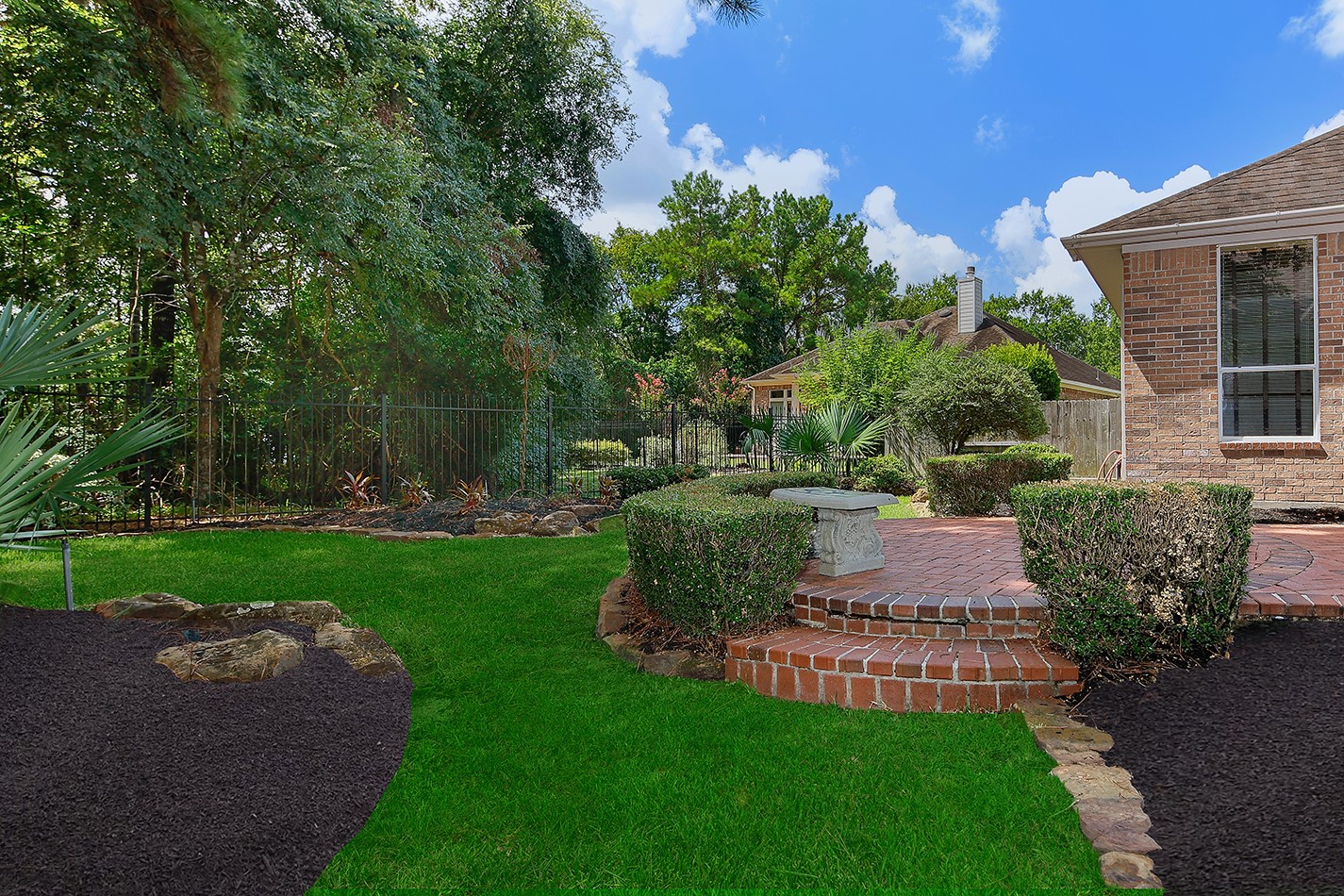 7 Sovereign Way Conroe, TX 77384 - Photo 33 of 47 a garden view with a seating space