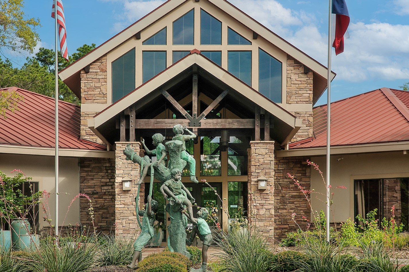 7 Sovereign Way Conroe, TX 77384 - Photo 41 of 47 a front view of a house with plants
