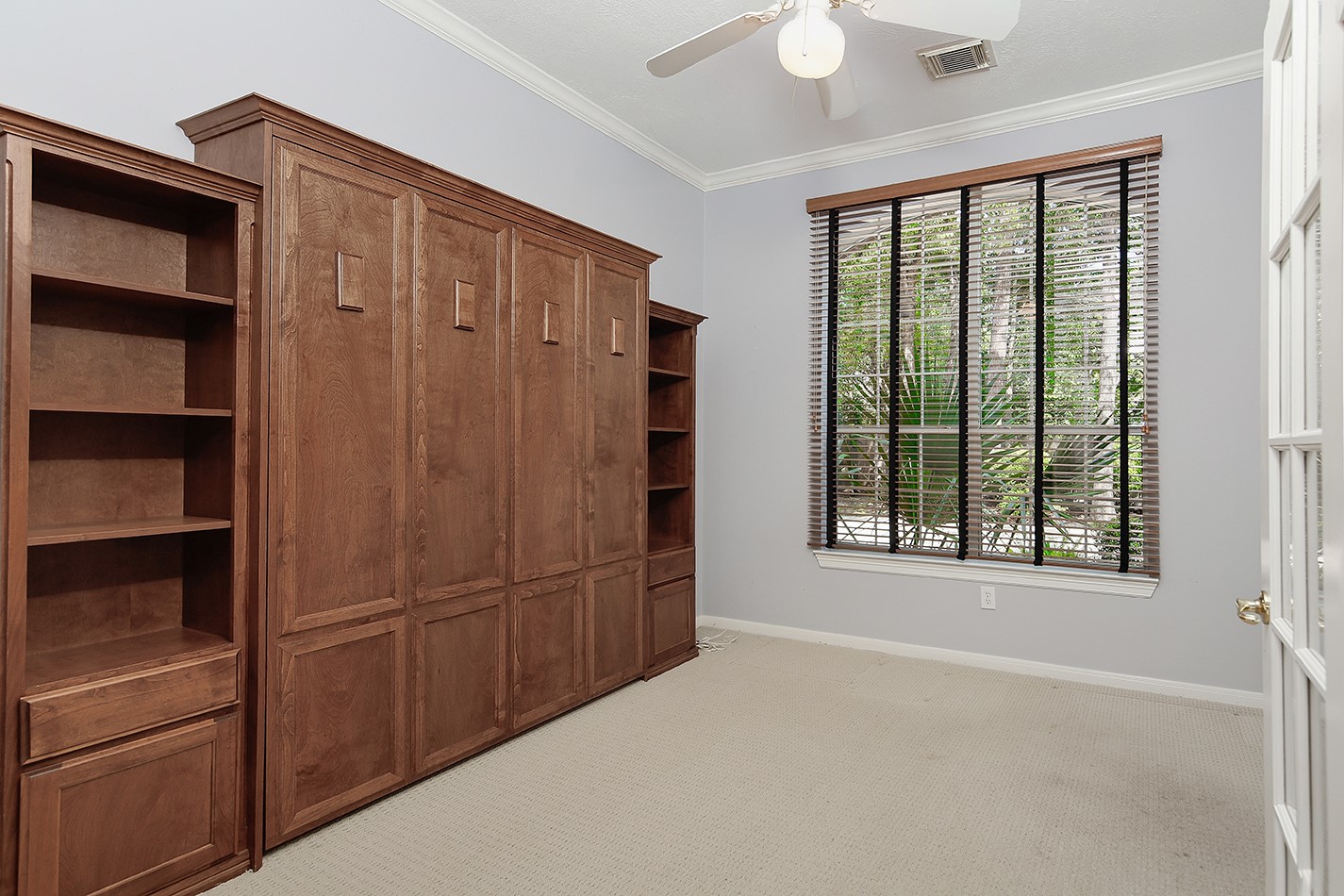 7 Sovereign Way Conroe, TX 77384 - Photo 6 of 47 a view of an empty room with a window