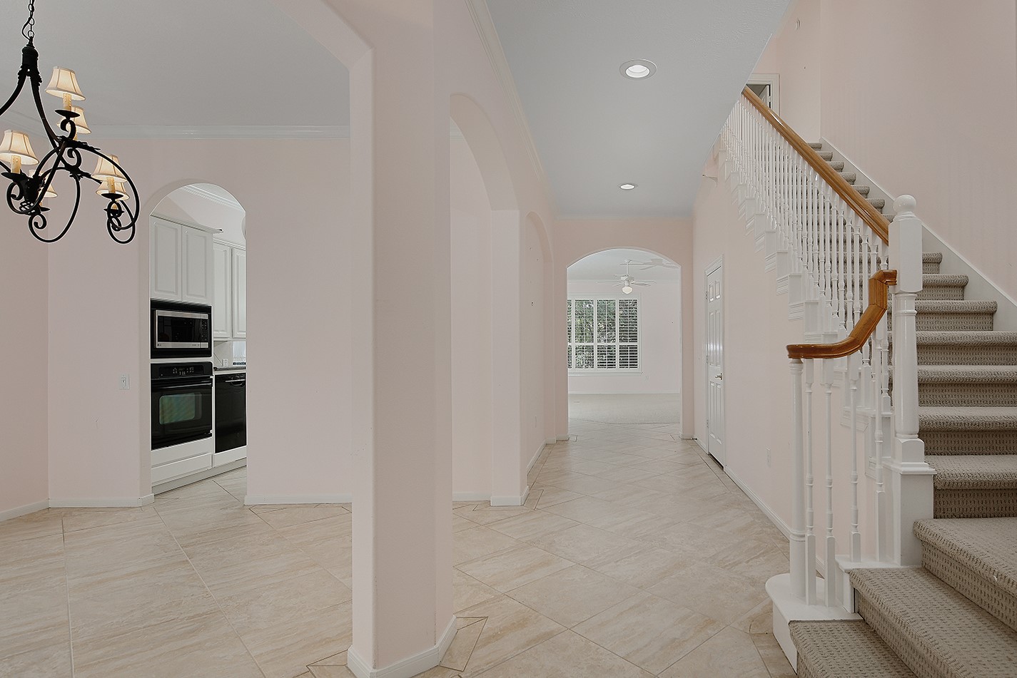 7 Sovereign Way Conroe, TX 77384 - Photo 7 of 47 a view of a hallway with stairs