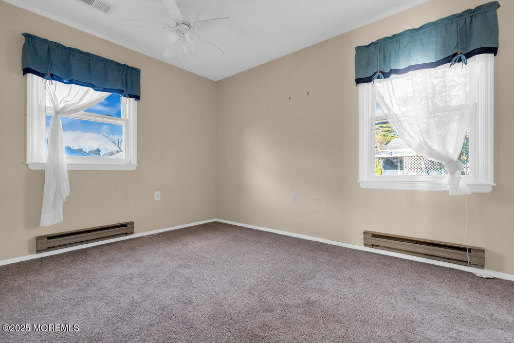 9 Apple Lane Whiting, NJ 08759 - Photo 17 of 17 an empty room with windows and painted walls