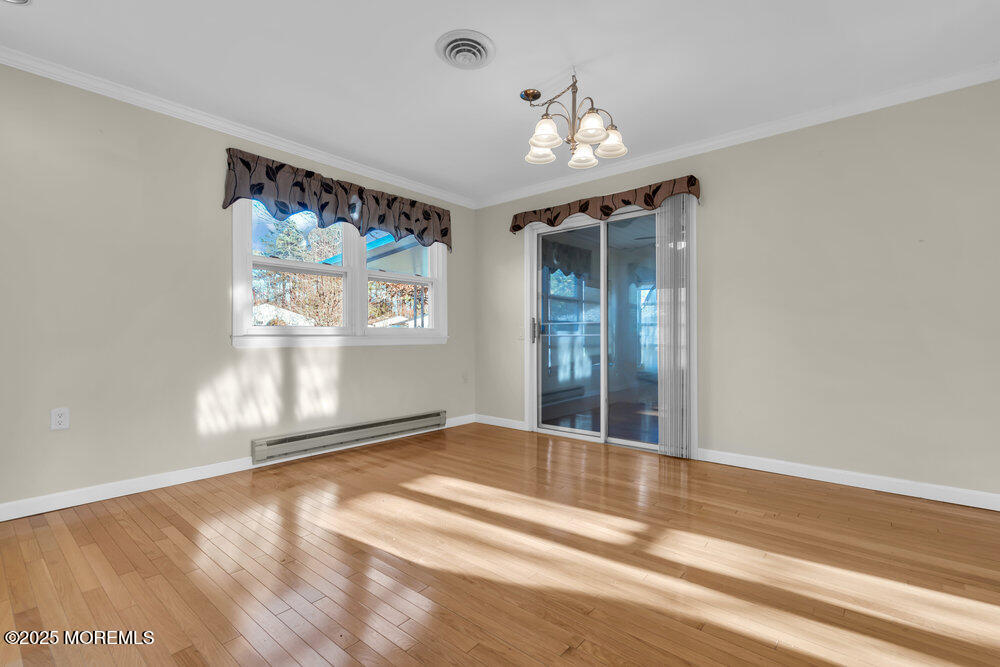 9 Apple Lane Whiting, NJ 08759 - Photo 7 of 17 a view of an empty room with a window