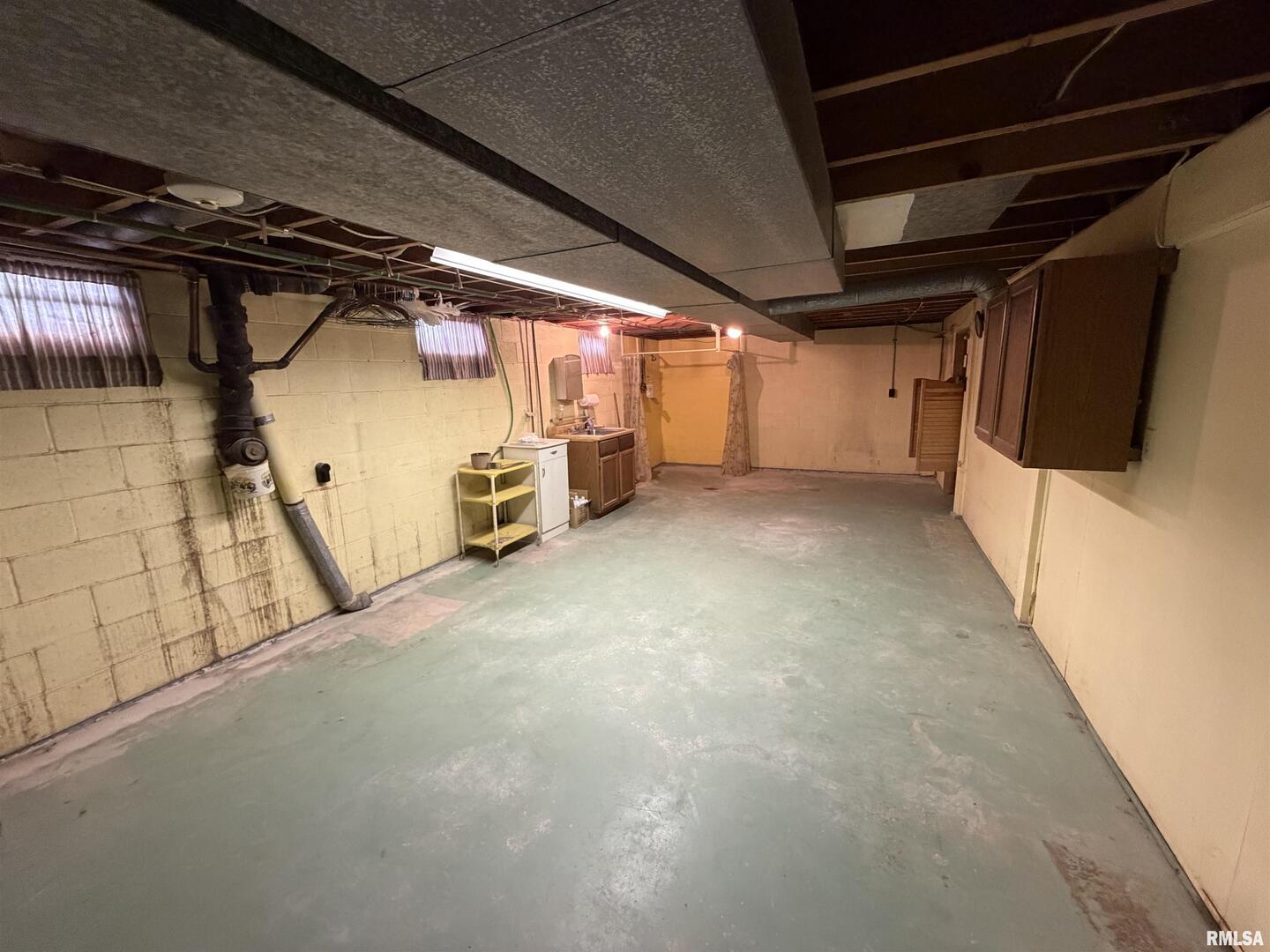 712 3rd Street Seaton, IL 61476 - Photo 12 of 15 a view of empty room with wooden walls
