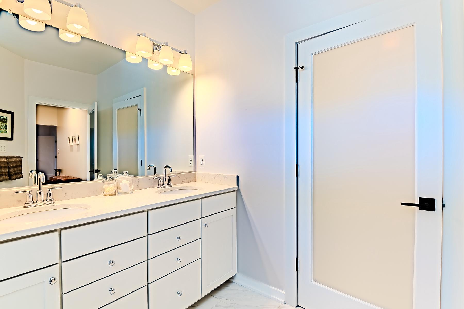 34258 Spring Brook Avenue Lewes, DE 19958 - Photo 24 of 38 Double vanities bring ease and comfort.