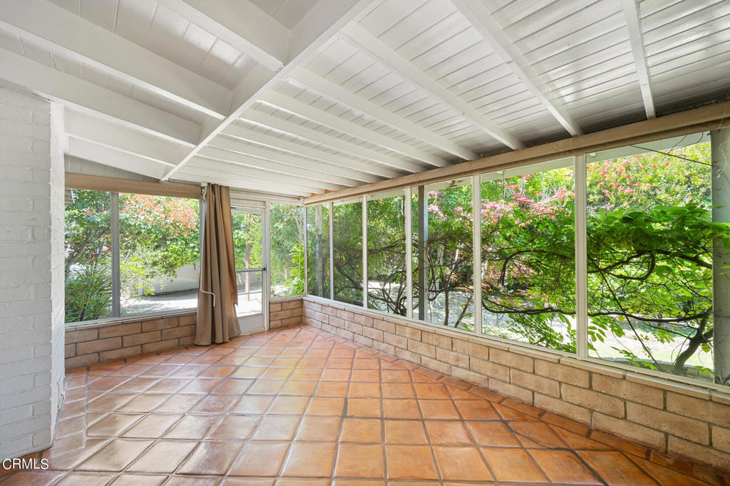 17149 Bullock Street Encino, CA 91316 - Photo 26 of 32 a view of empty room with large windows