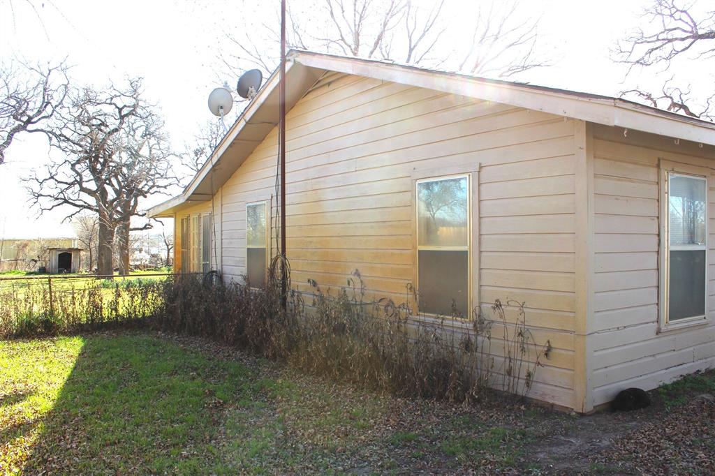 403 Mockingbird Street Chico, TX 76431 - Photo 2 of 25 a view of a small house
