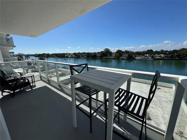 a view of a terrace with seating area
