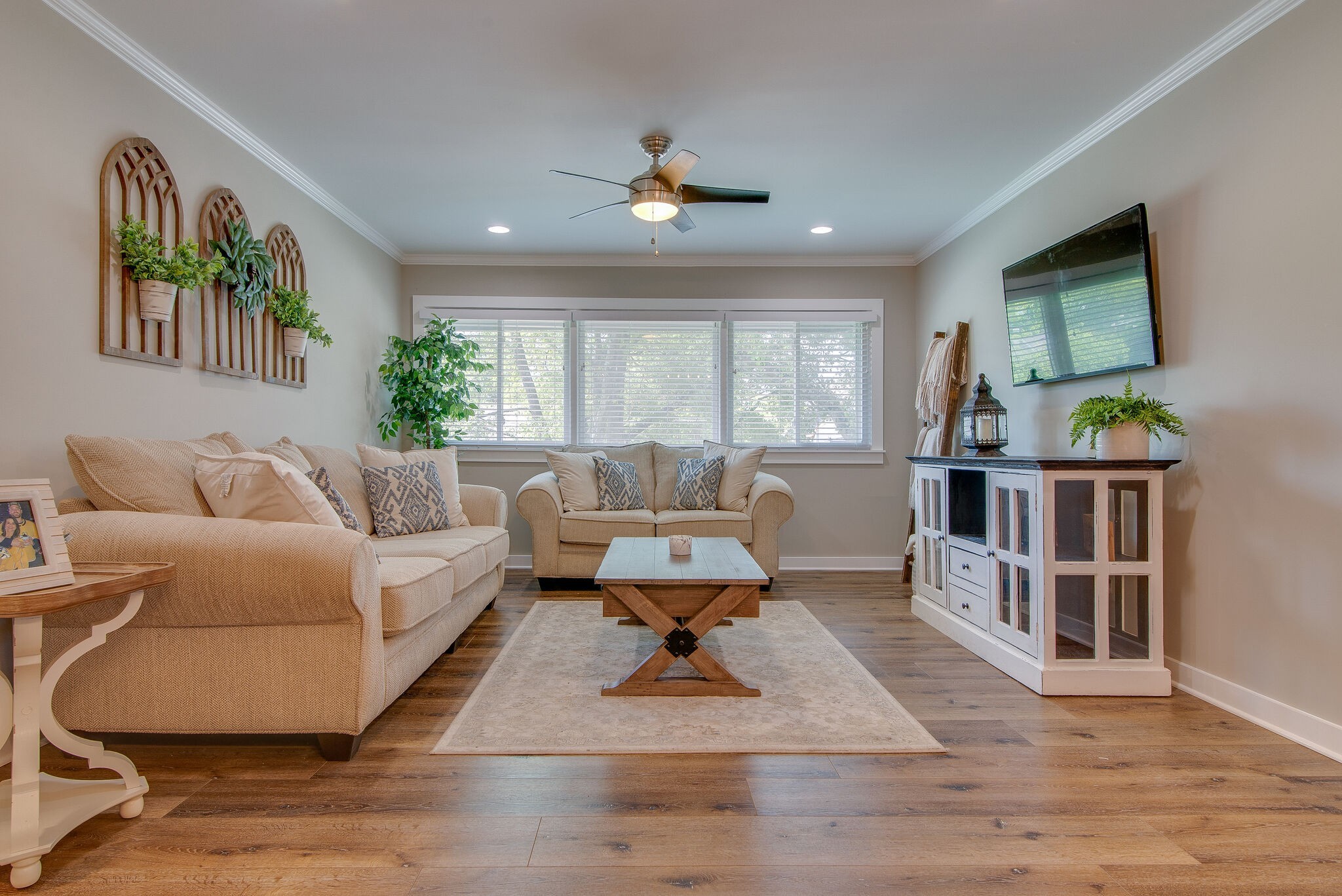 a living room with furniture and a window