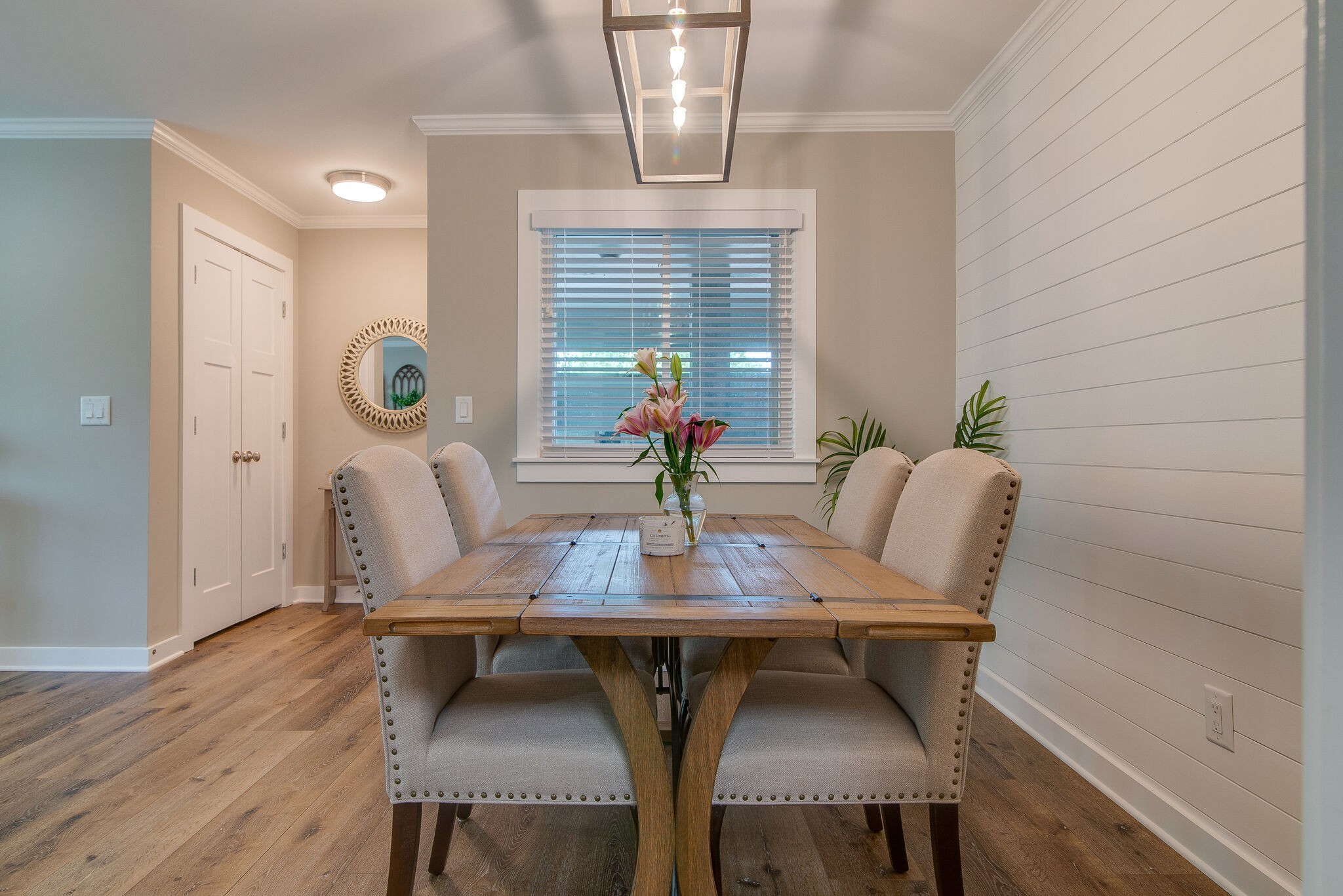1900 Richard Jones Road, Unit R4 Nashville, TN 37215 - Photo 11 of 32 a view of a dining room with furniture and wooden floor