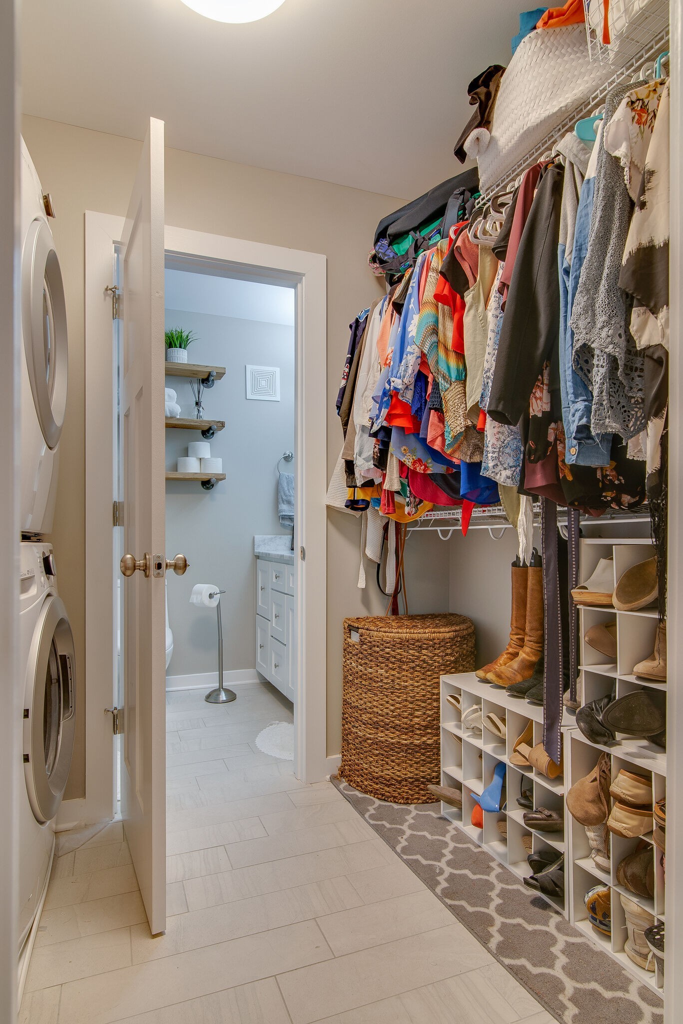 1900 Richard Jones Road, Unit R4 Nashville, TN 37215 - Photo 19 of 32 a view of walk in closet with clothes and shoes