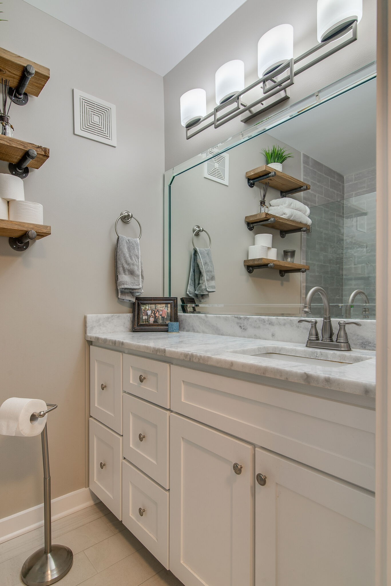 1900 Richard Jones Road, Unit R4 Nashville, TN 37215 - Photo 21 of 32 a bathroom with a granite countertop sink a mirror and vanity