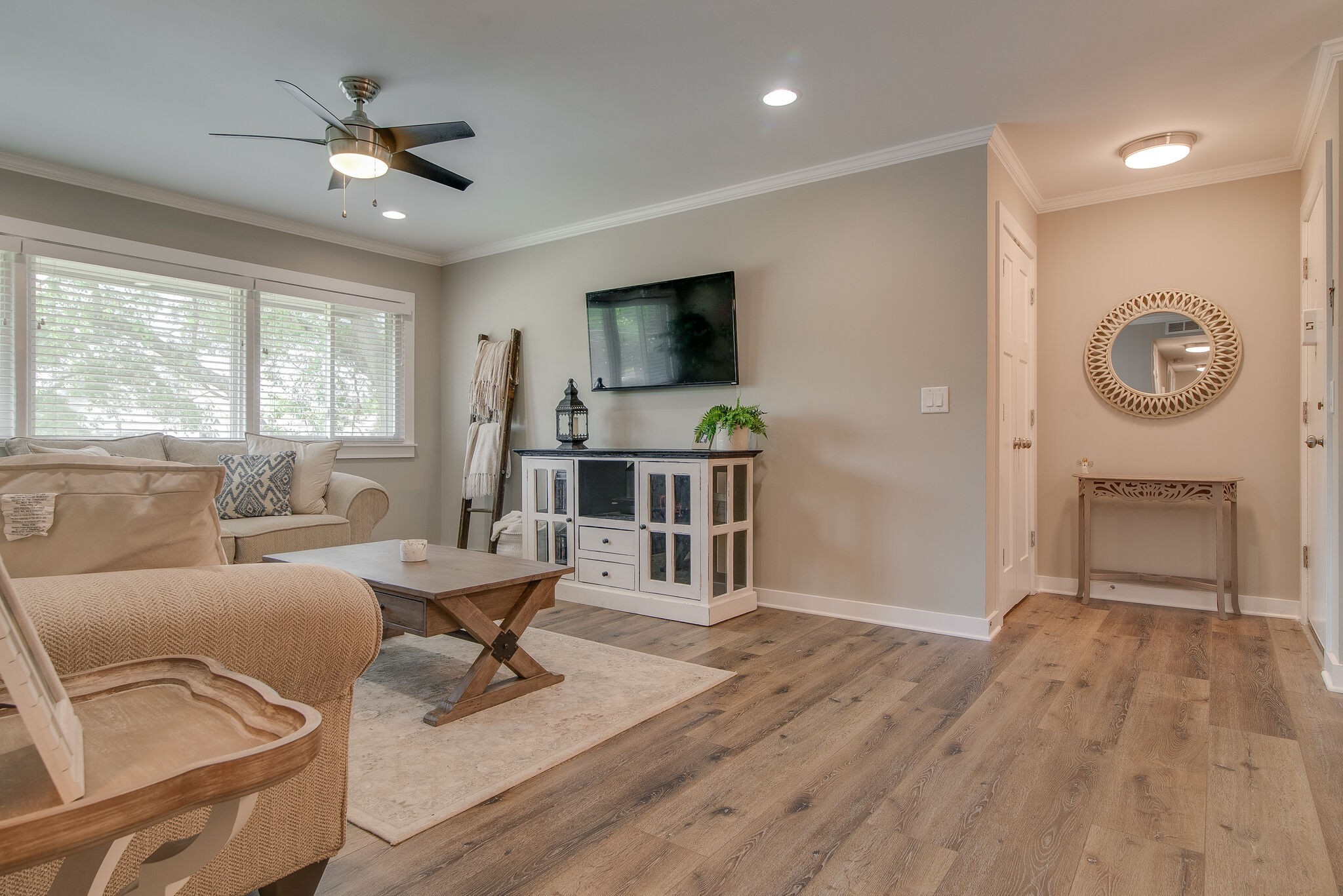 1900 Richard Jones Road, Unit R4 Nashville, TN 37215 - Photo 8 of 32 a living room with furniture a window and a flat screen tv