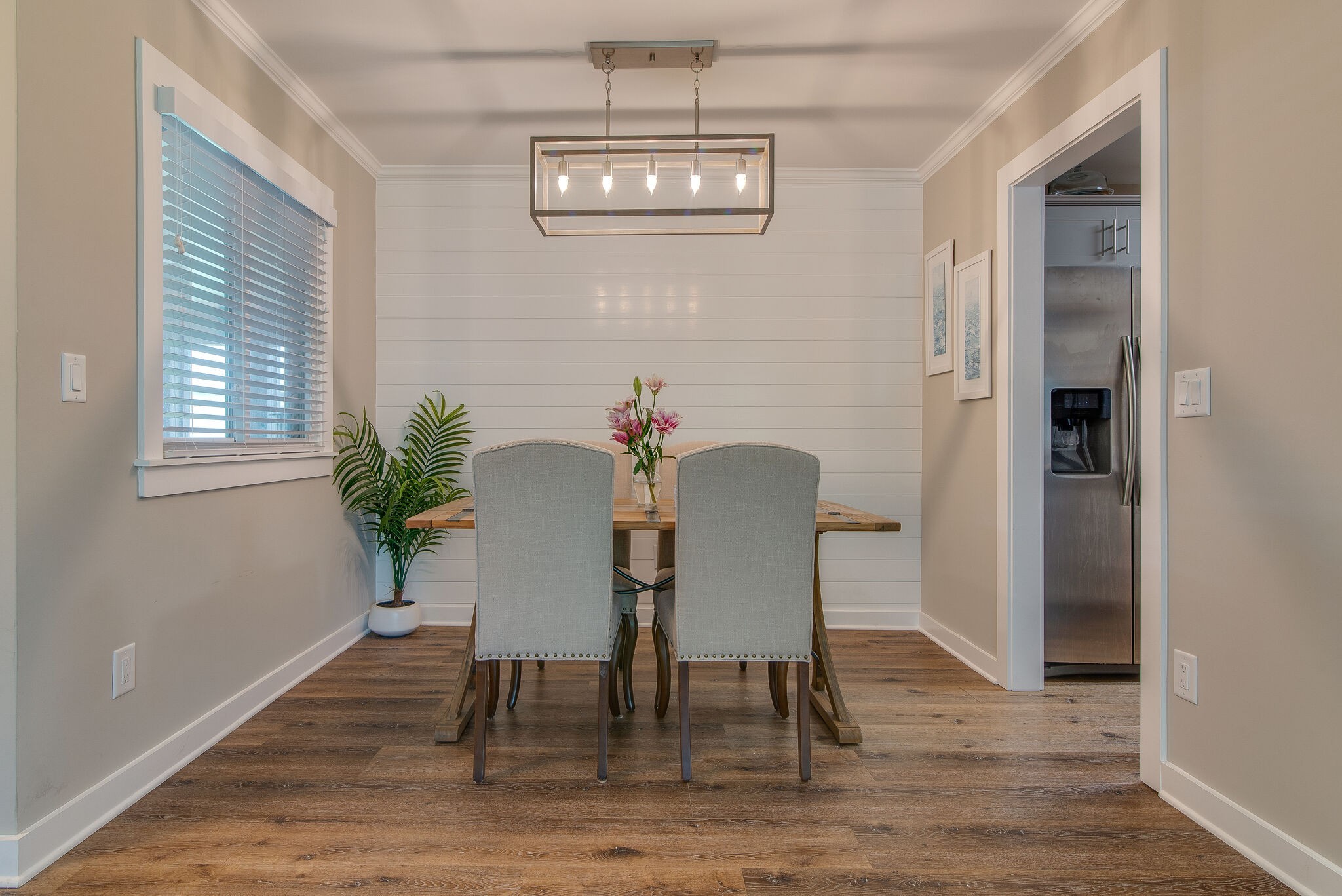 1900 Richard Jones Road, Unit R4 Nashville, TN 37215 - Photo 10 of 32 a view of a dining room with furniture window and wooden floor