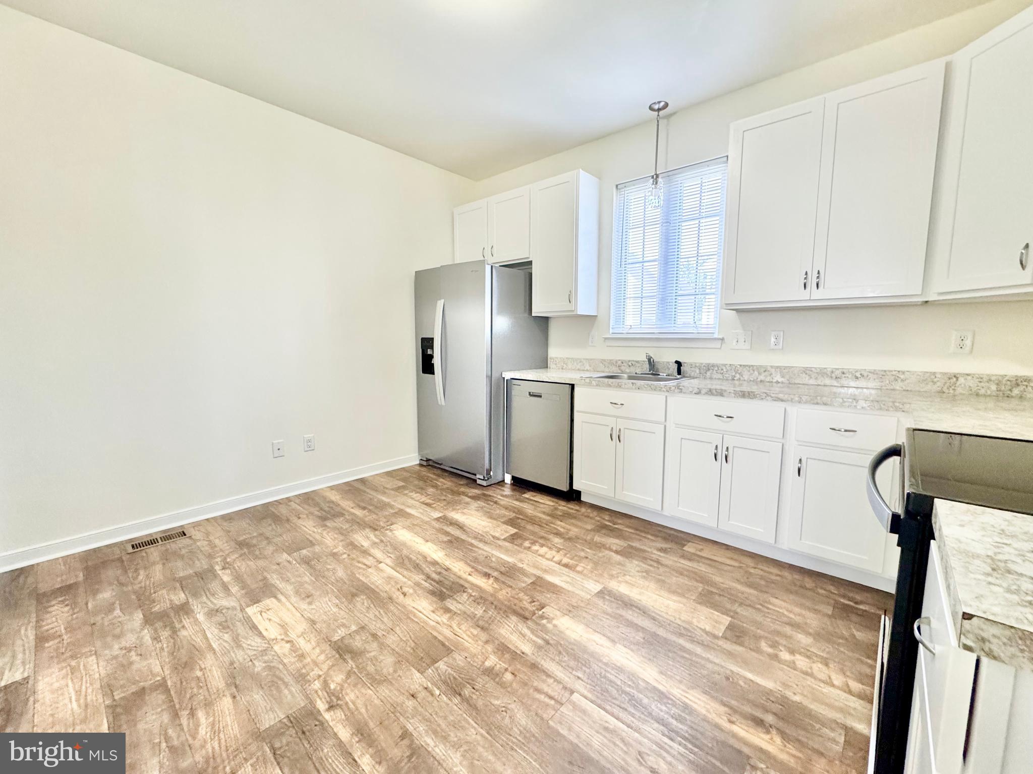 656 Venue Drive Dover, DE 19901 - Photo 13 of 29 a view of a kitchen with a sink