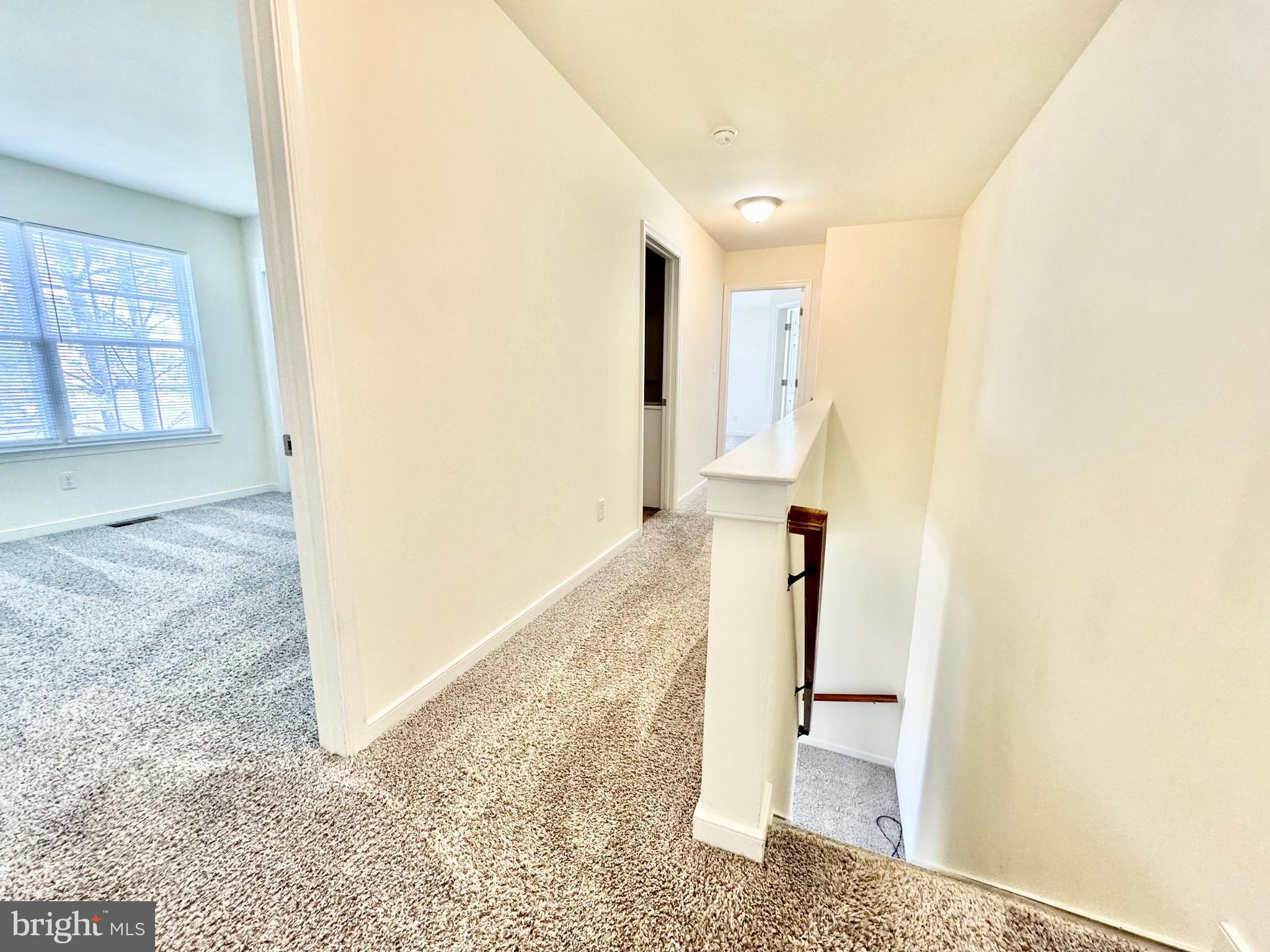 656 Venue Drive Dover, DE 19901 - Photo 18 of 29 a view of a hallway with windows