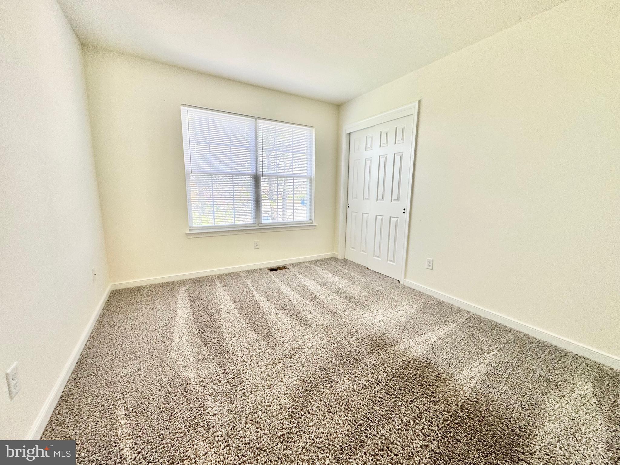 656 Venue Drive Dover, DE 19901 - Photo 21 of 29 an empty room with a window