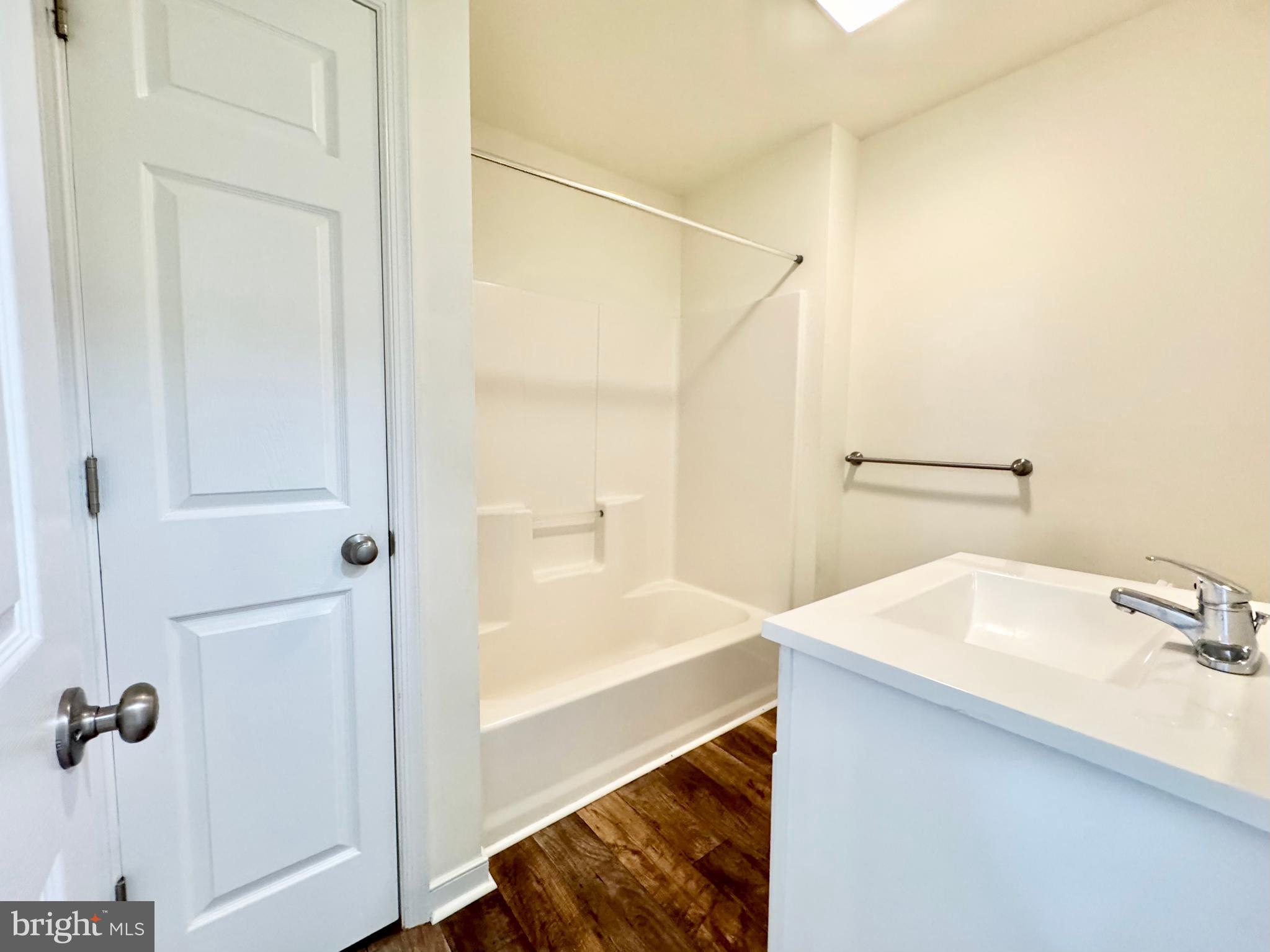 656 Venue Drive Dover, DE 19901 - Photo 23 of 29 a bathroom with a sink and a mirror