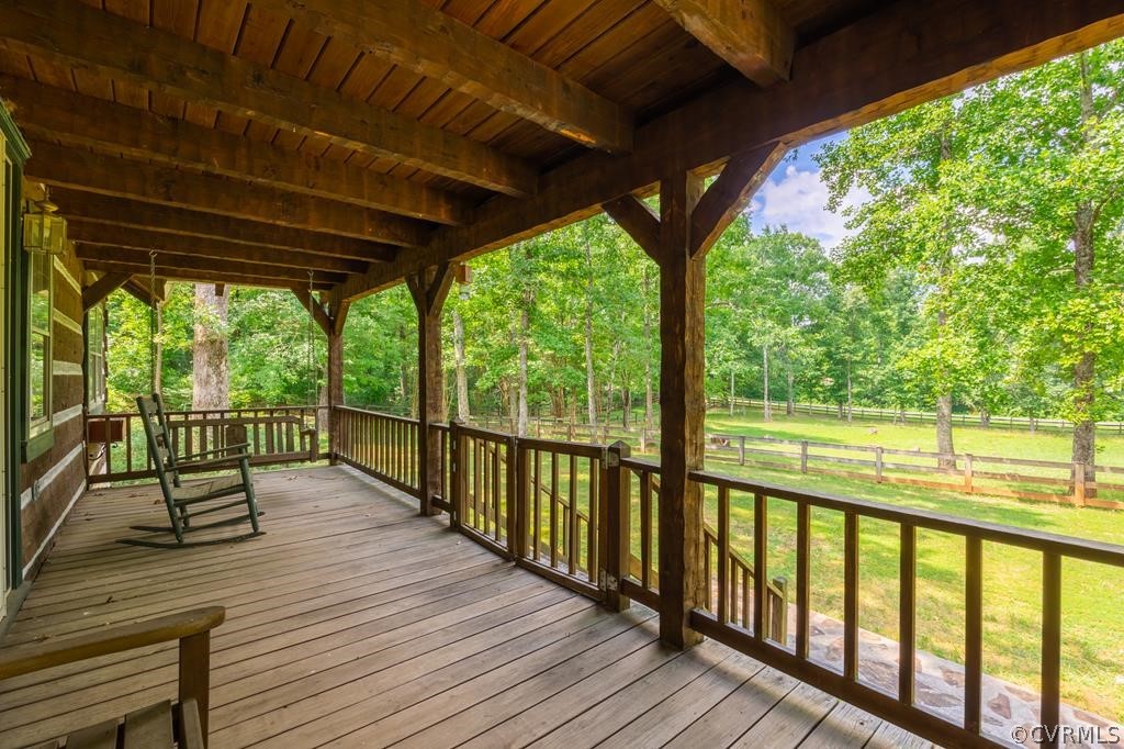 14041 County Line Road Keysville, VA 23947 - Photo 2 of 10 a view of a two room with wooden floor and outdoor seating