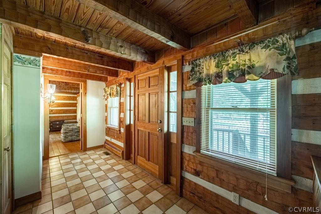 14041 County Line Road Keysville, VA 23947 - Photo 3 of 10 a view of a porch with a table and chairs